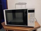 1.5 years used LG microwave oven white color