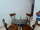 4 Chair top glass dining table