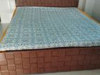 6/7 feet king size bed. Canadian oak fully new condition with mattress