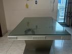 6 chair dining table, silver colour, glass on top