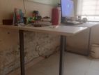 6 ft by 4 white table top desk with steel legs