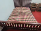A Luxurious Wooden Double Bed