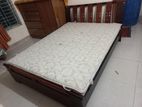 A Regal bed and side drawer