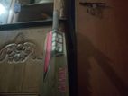 A wooden ball cricket bat