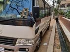 AC coaster bus for rent