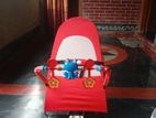 Baby bouncer chair with toys