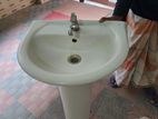 Basin with stand and water tap