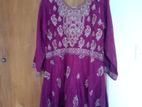 Beautiful purple long dress with intricate golden embroidery
