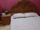 Bed and bedside table
