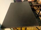 Black ms and partex table with 1 bench