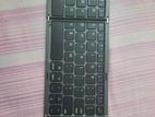 Bluetooth keyboard with mouse pad