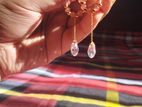 Brand new crystal earrings with original pink onyx beads.