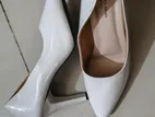 Brand new white heel.