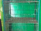 চার খোপের লোহার খাঁচা