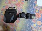 Canon 1000D + 18mm-55mm lens