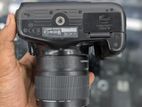 Canon 1100D camera with 18-55mm lens