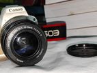 Canon 200D with 18-55mm. Excellent condition. White body.