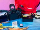 Canon 600d with 18-55mm lens. new condition