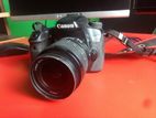 Canon EOS 70D with 18-55mm kit lens and 55-250mm zoom lens.