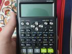 CASIO fx-991 ES plus scientific calculator with warranty card