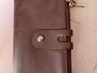 Chocolate color leather money bag