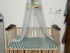 Convertible Wooden Baby Crib (2-in-1) with Mosquito Net and Mobile Toys