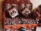 🛋️ ডাবল সিট সোফা + টেবিল, আরামদায়ক বালিশসহ, আজই নিন বাড়ির জন্য।