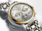 Design: Stainless steel band with silver and gold tone accents.