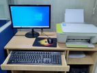 Desktop with Monitor and Hp Printer