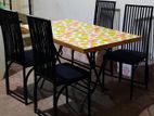 Dining table and 4 metal chairs