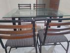 Dining table and chairs set