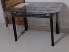 Dining table with top glass