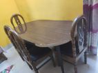 Dinning table with 4 barmatic segun wooden chair