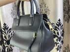 "Elegant Black Handbag Perfect for Daily Use & Special Occasions"