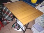 Foldable table and plastic chair