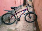 Gear 26 size bicycle for sale.