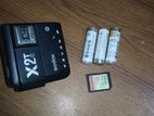 Godox x2T.. flash trigger. 32GB SanDisk memory. 4 pis battery.