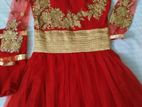 Red gown with embroidery work