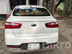 Kia Rio . 2013