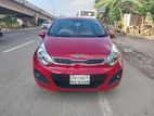 Kia Rio . 2012