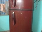 "LG refrigerator for sale in a stylish red wine color.