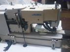 Manuel button hole machine
