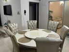 Marble dining table round shape and wood with leather chair