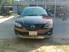 Mazda Axela . 2004