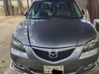 Mazda Axela gray 2005