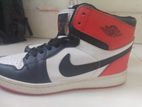 Miles morals Nike high top