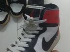 miles morals Nike high top sneakers