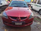 Mitsubishi Lancer . 2004