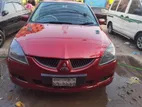 Mitsubishi Lancer . 2004