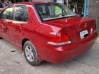 Mitsubishi Lancer red 2006